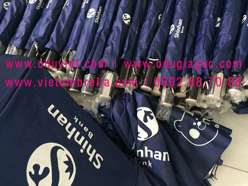 xưởng sản xuất ô dù cầm tay in logo quảng cáo